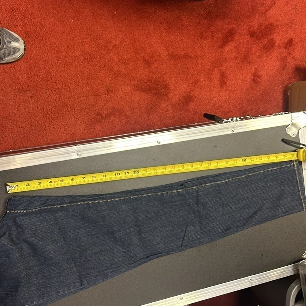 94.  Michael Kors dark blue skinny jeans with embellished pockets size 4